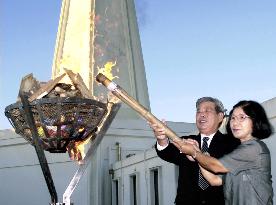 People commemorate eve of anniversary of end of Okinawa battle